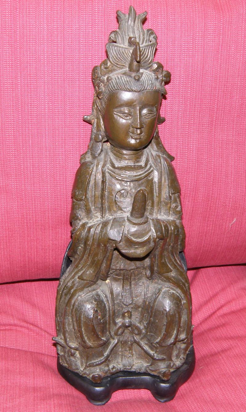 A Ming Dynasty Buddhistic Bronze with traces of original gilt decoration    SOLD