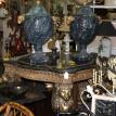 Pair blue urns on lion table 