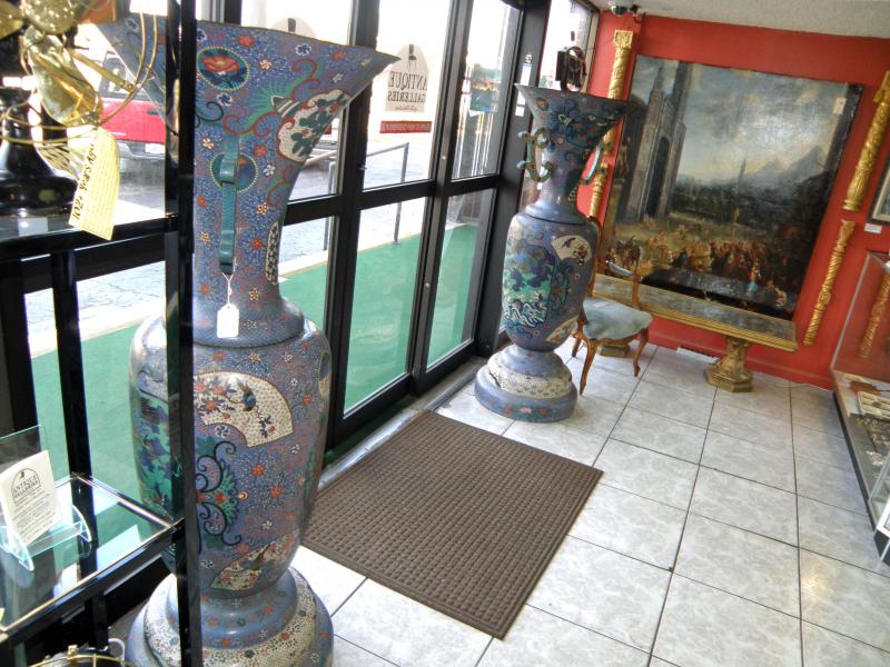 We have a pair of very special and very large cloisonne vases.