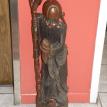 Wood carving man with staff