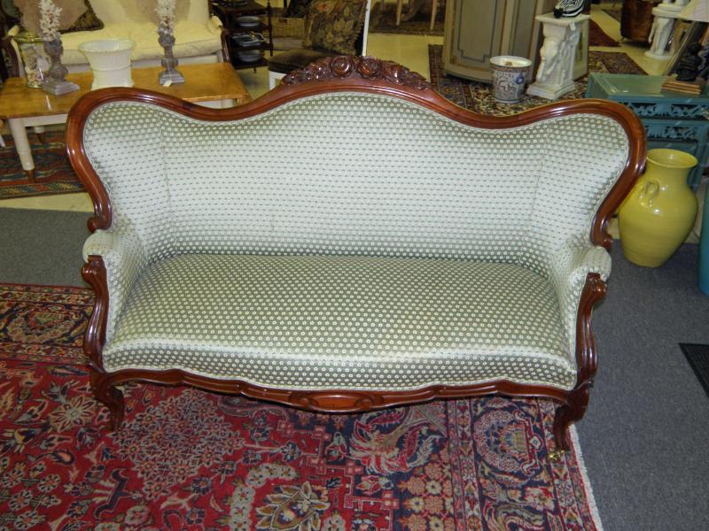 Victorian Walnut Highly Camel Back Carved Settee 